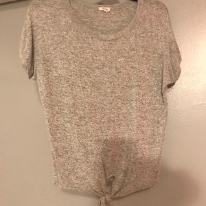 grey marshall’s tie shirt
